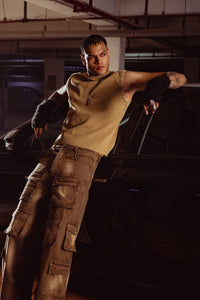 Front view of premium beige men’s tank top, ideal for high end casual outfits