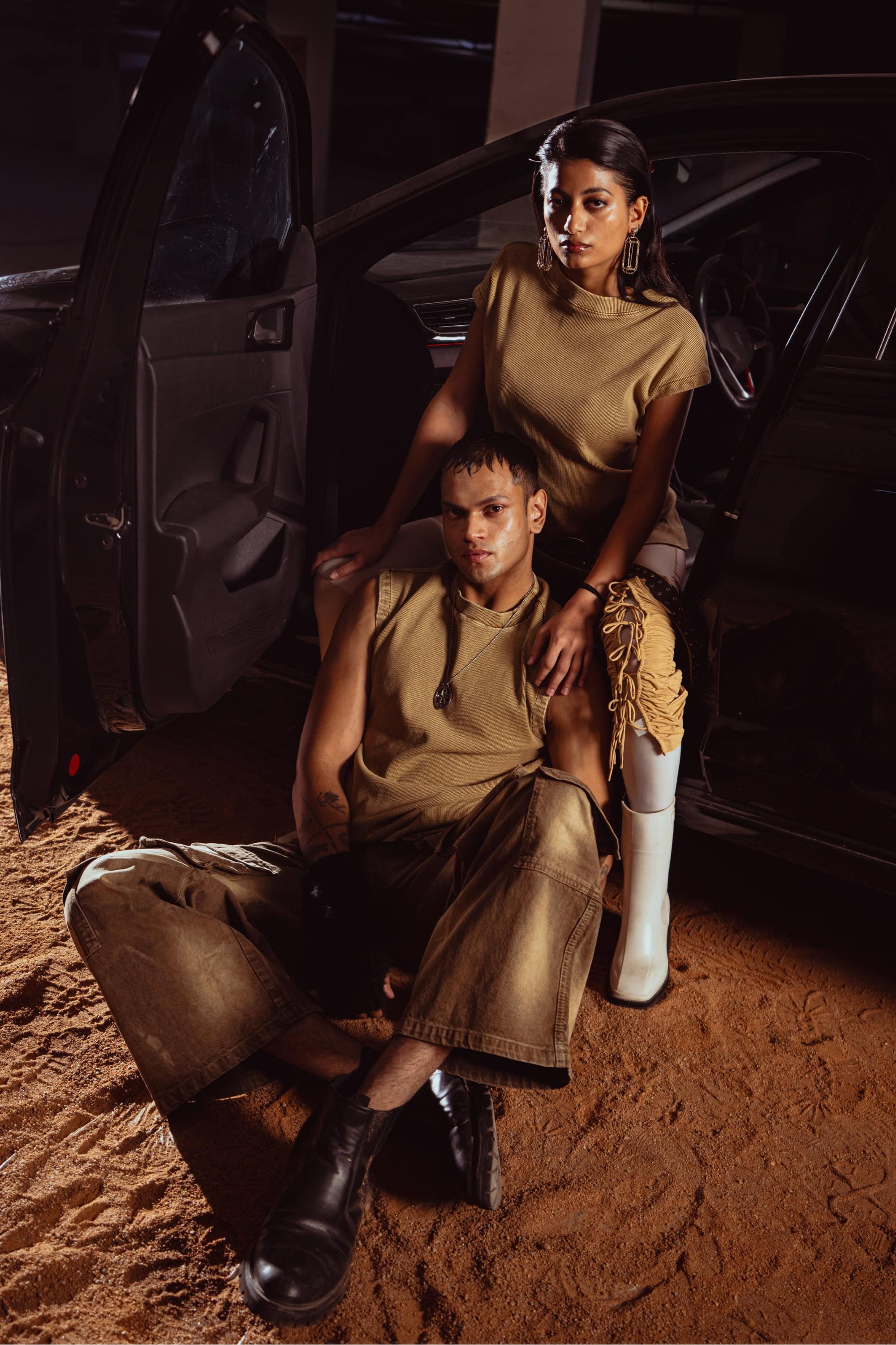 streetwear look featuring beige tank top with coordinated accessories and pants