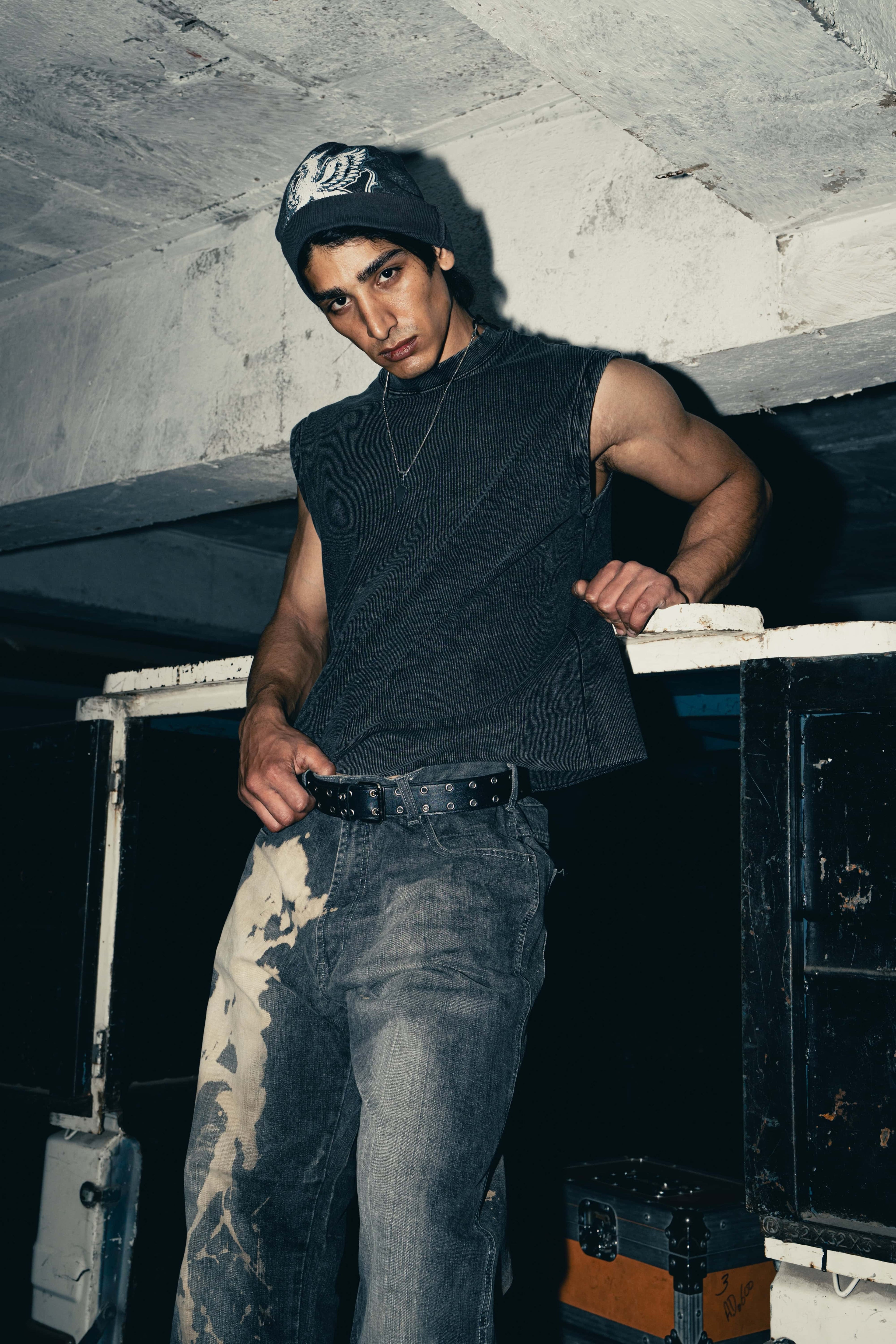 Charcoal cotton tank top with graphic design, perfect for streetwear fashion, offering a bold and trendy look