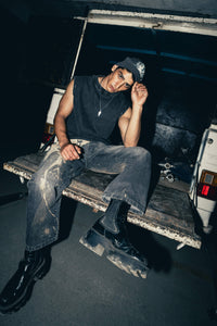 Charcoal cotton tank top with a modern fit, offering a relaxed streetwear look that’s perfect for layering or casual outings