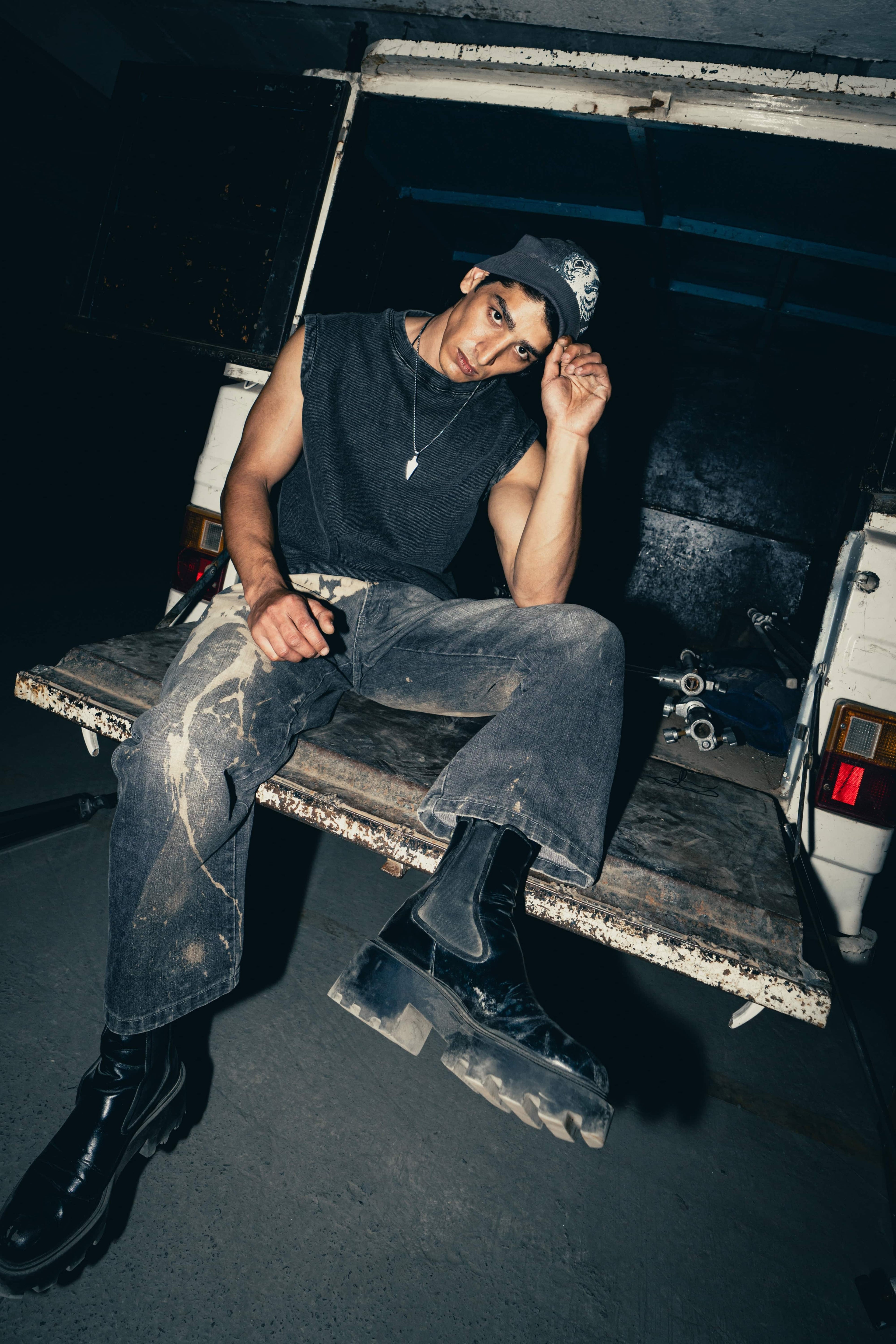 Charcoal cotton tank top with a modern fit, offering a relaxed streetwear look that’s perfect for layering or casual outings