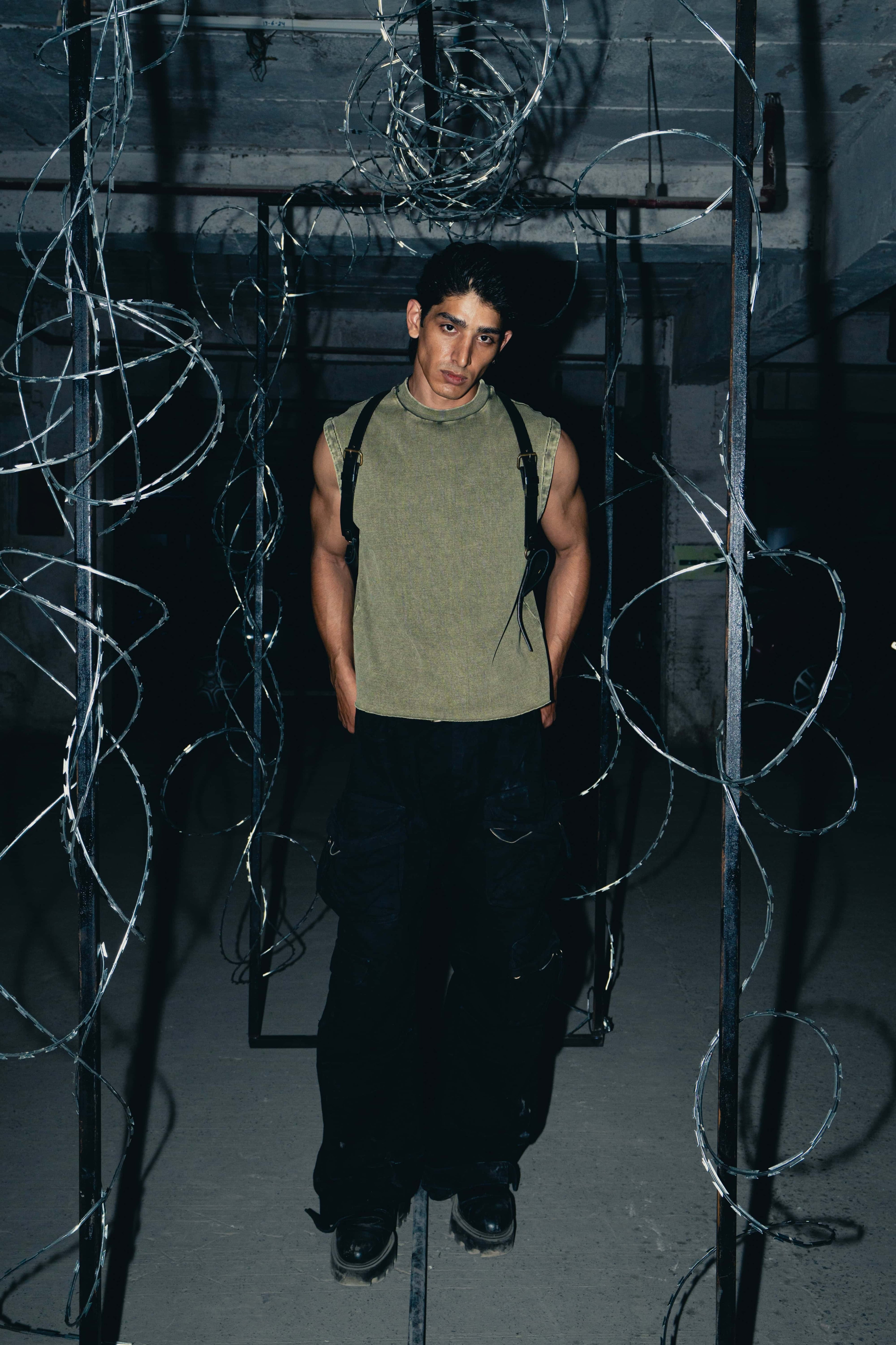 Tank top in premium cotton with a casual fit, designed in olive green for a modern urban style