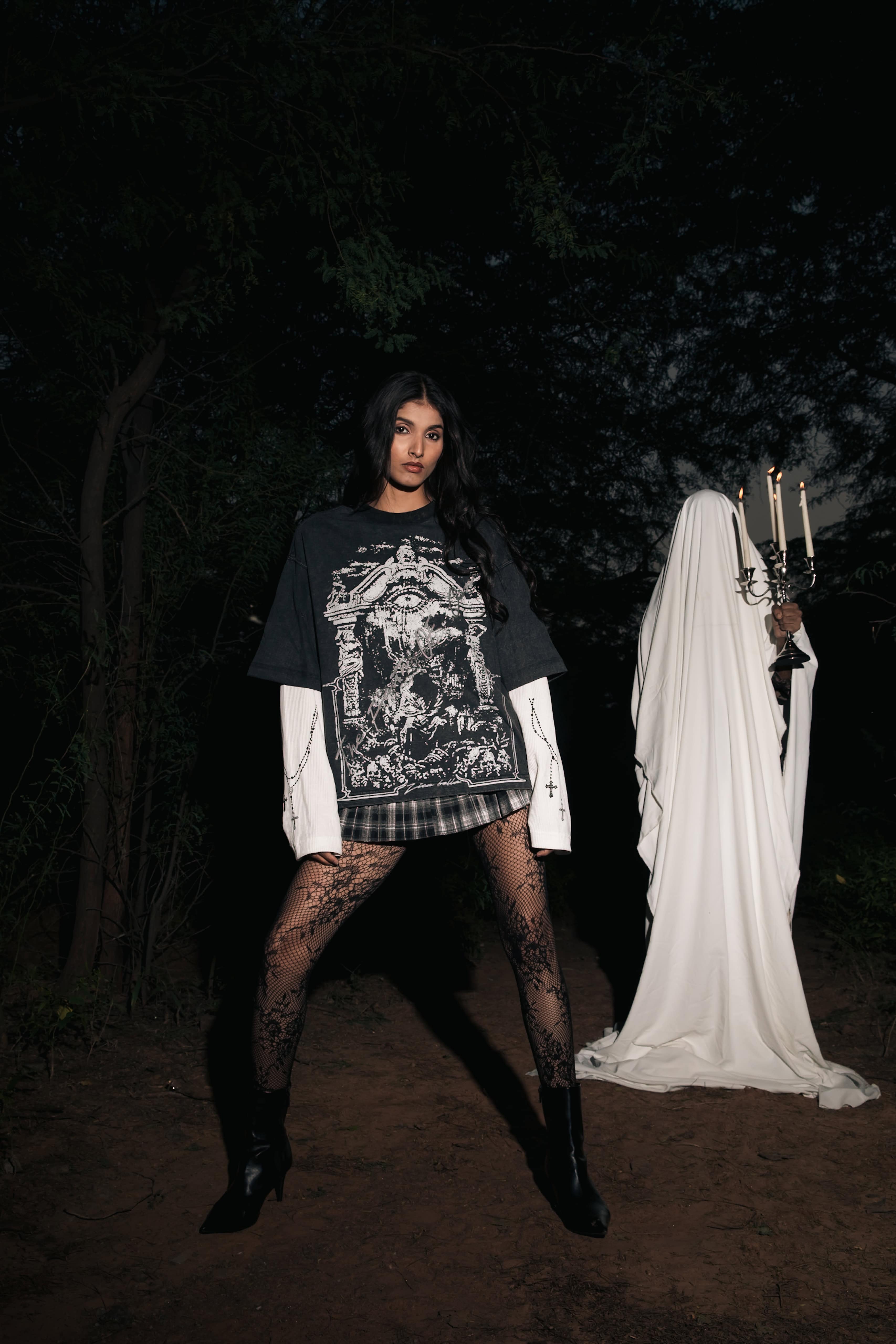 Black cotton graphic t-shirt featuring intricate faith-inspired artwork for modern streetwear