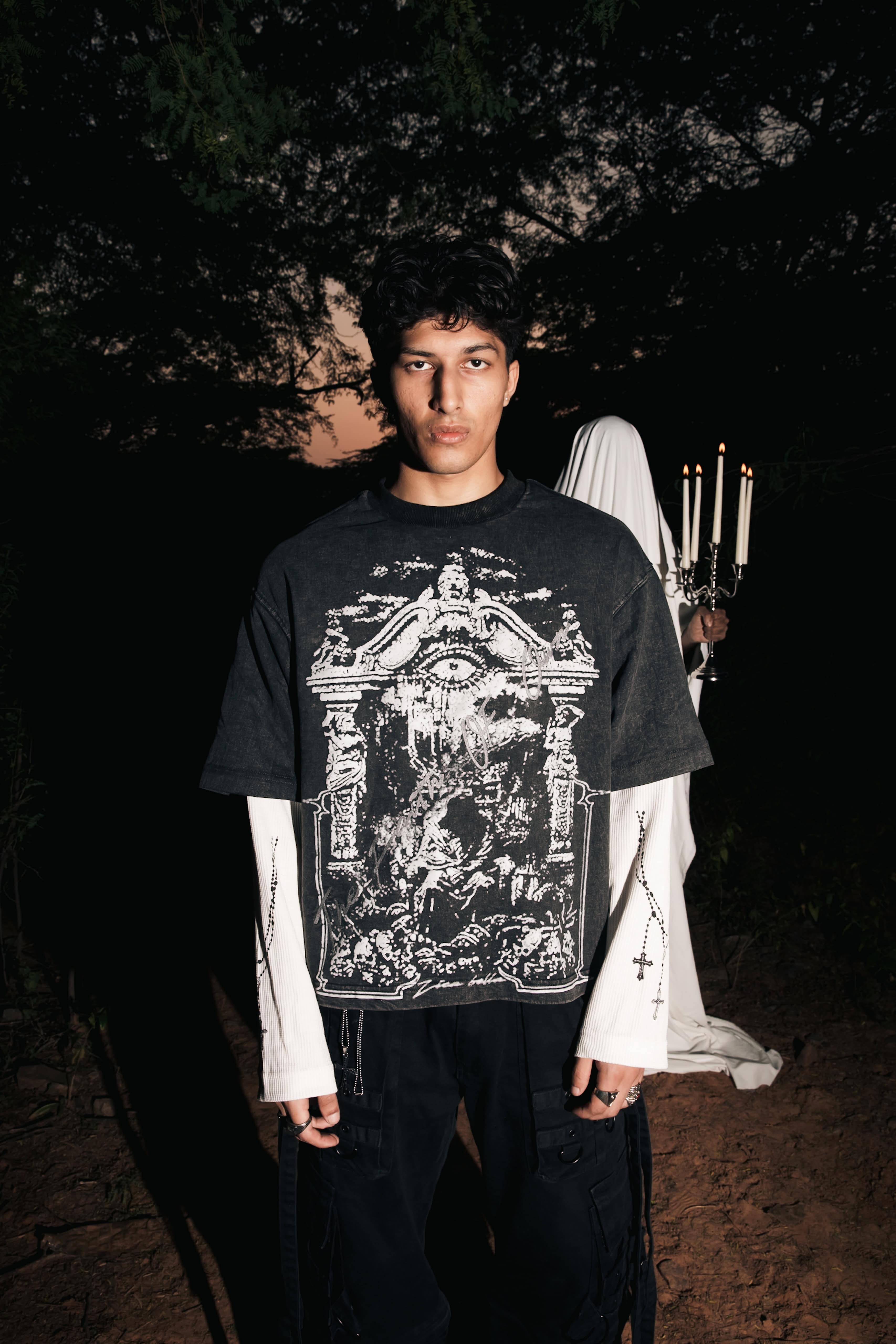 Black cotton graphic streetwear t-shirt featuring gothic artwork, styled for modern urban fashion