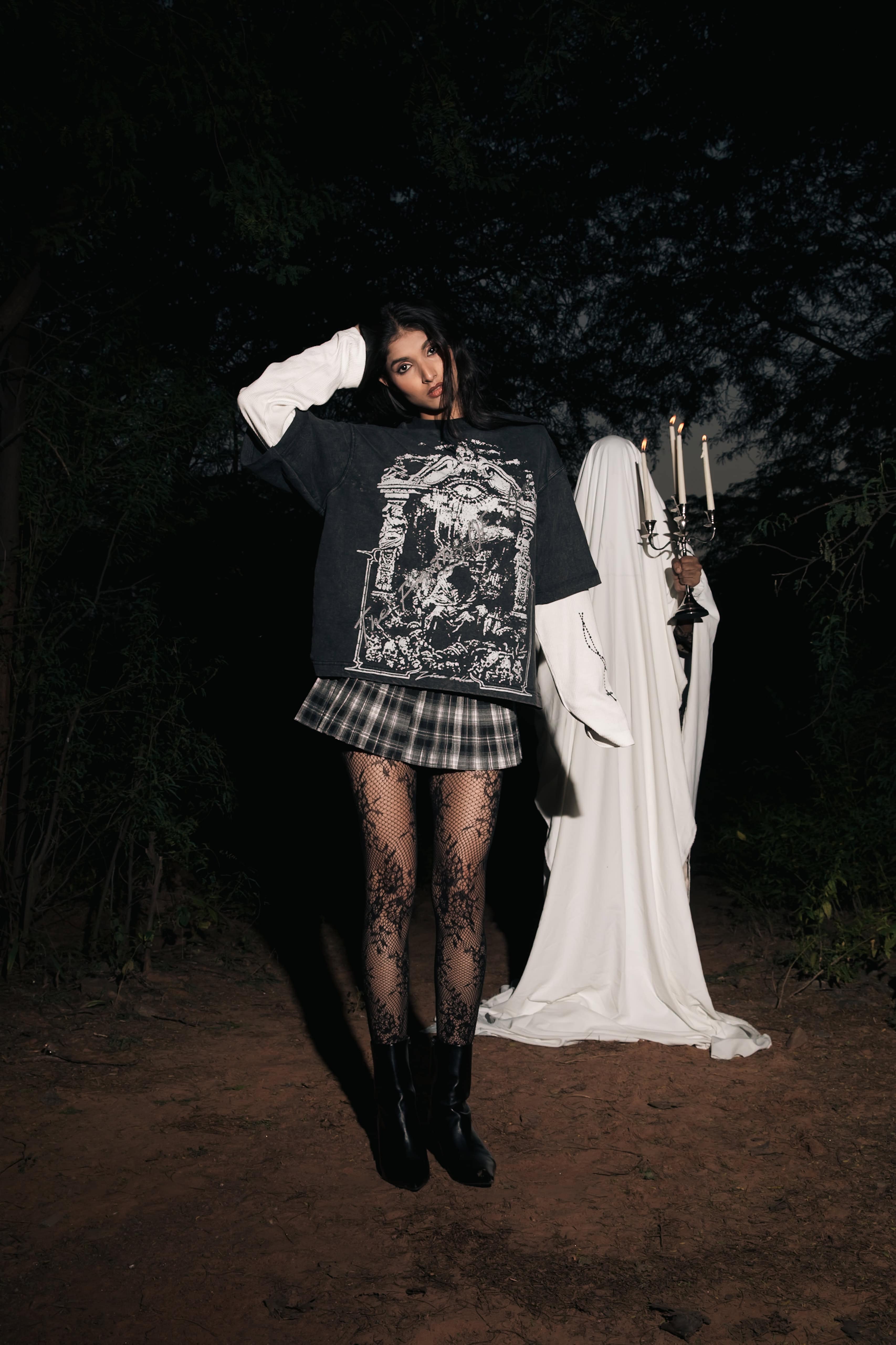 Layered black cotton streetwear t-shirt styled with relaxed fit for contemporary urban wear