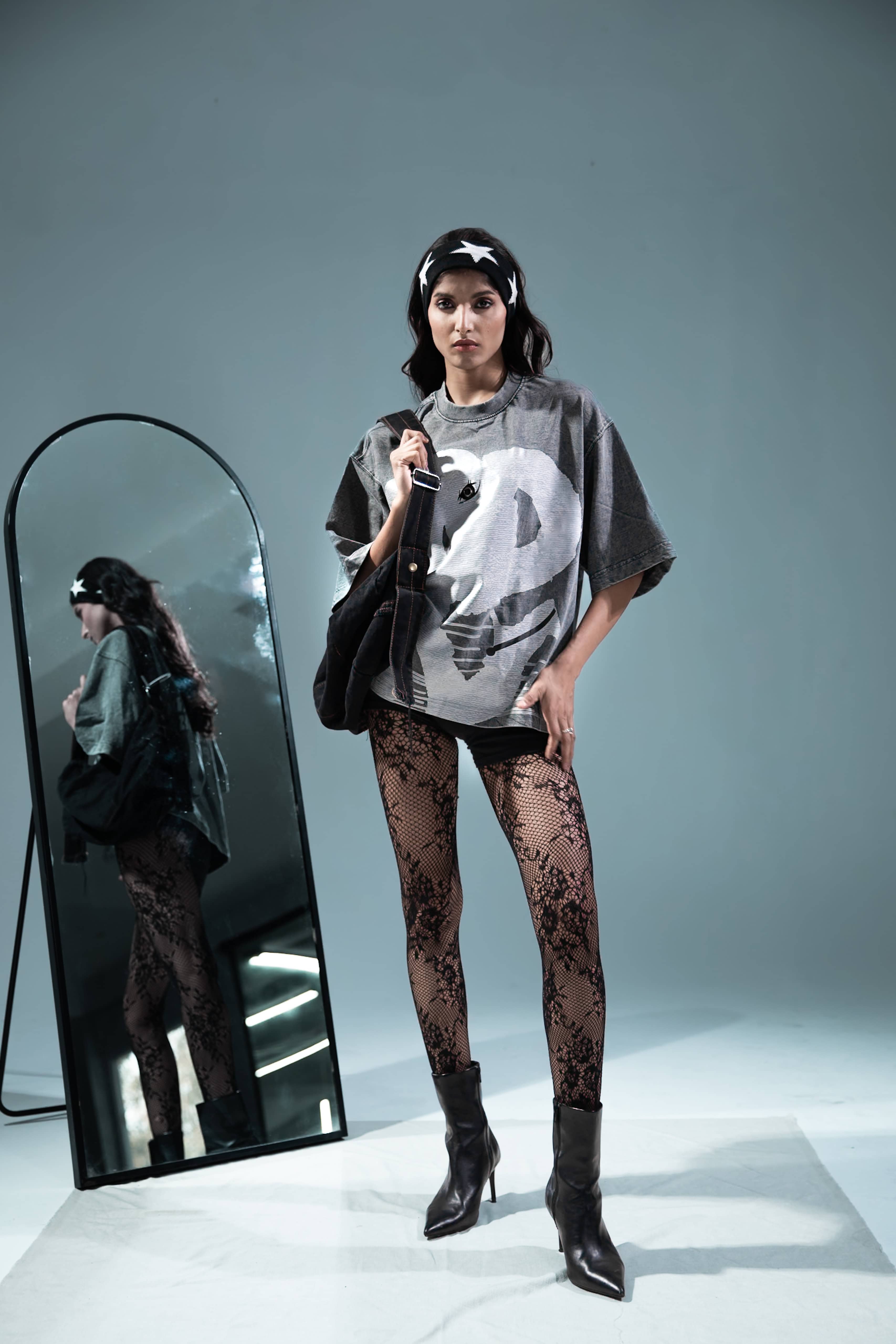 Grey cotton t-shirt with reflective back graphic print, an edgy addition to any street fashion collection