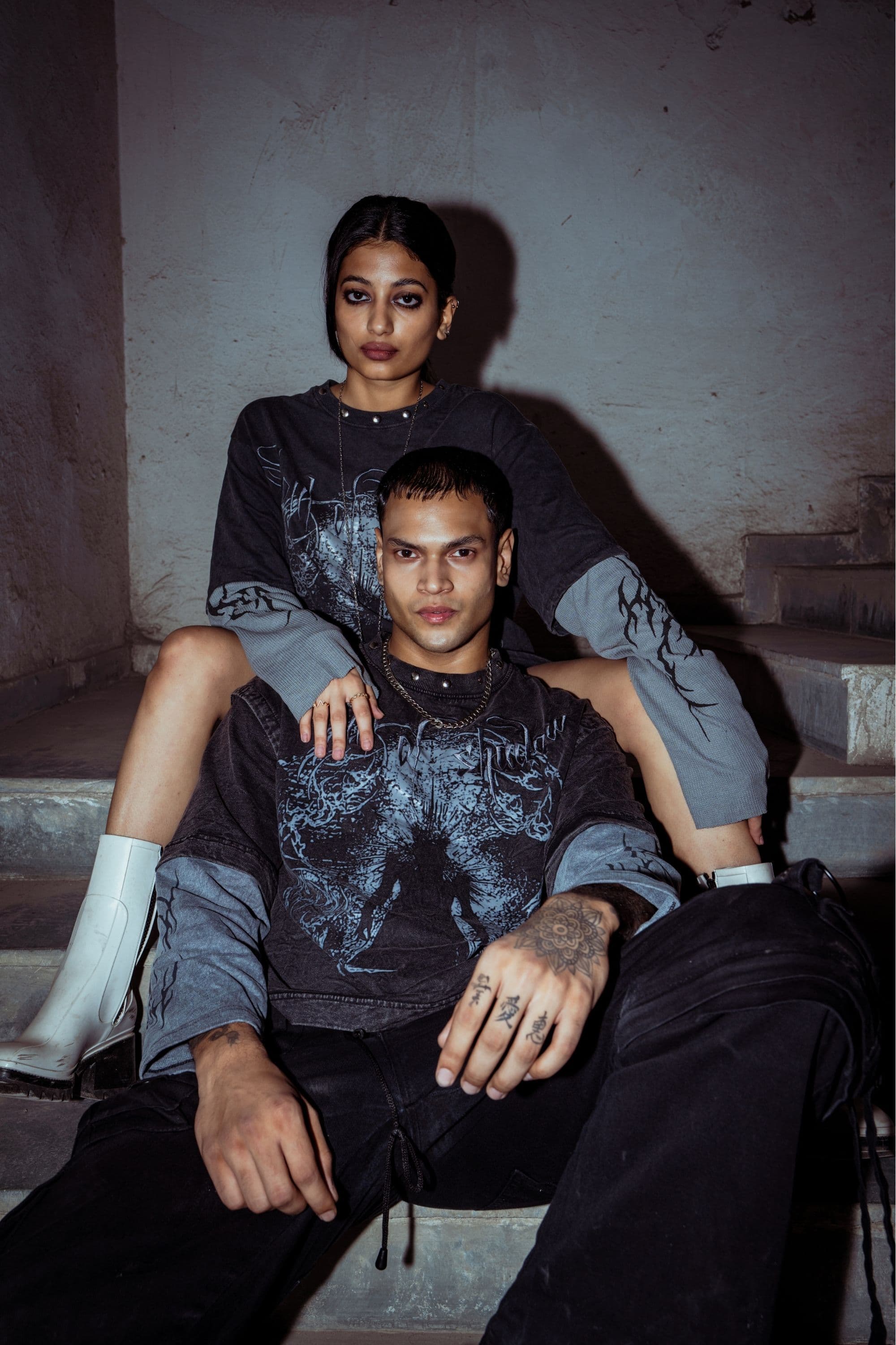 Heavyweight cotton T-shirt with relaxed fit, featuring a bold graphic print in washed black for a modern street look