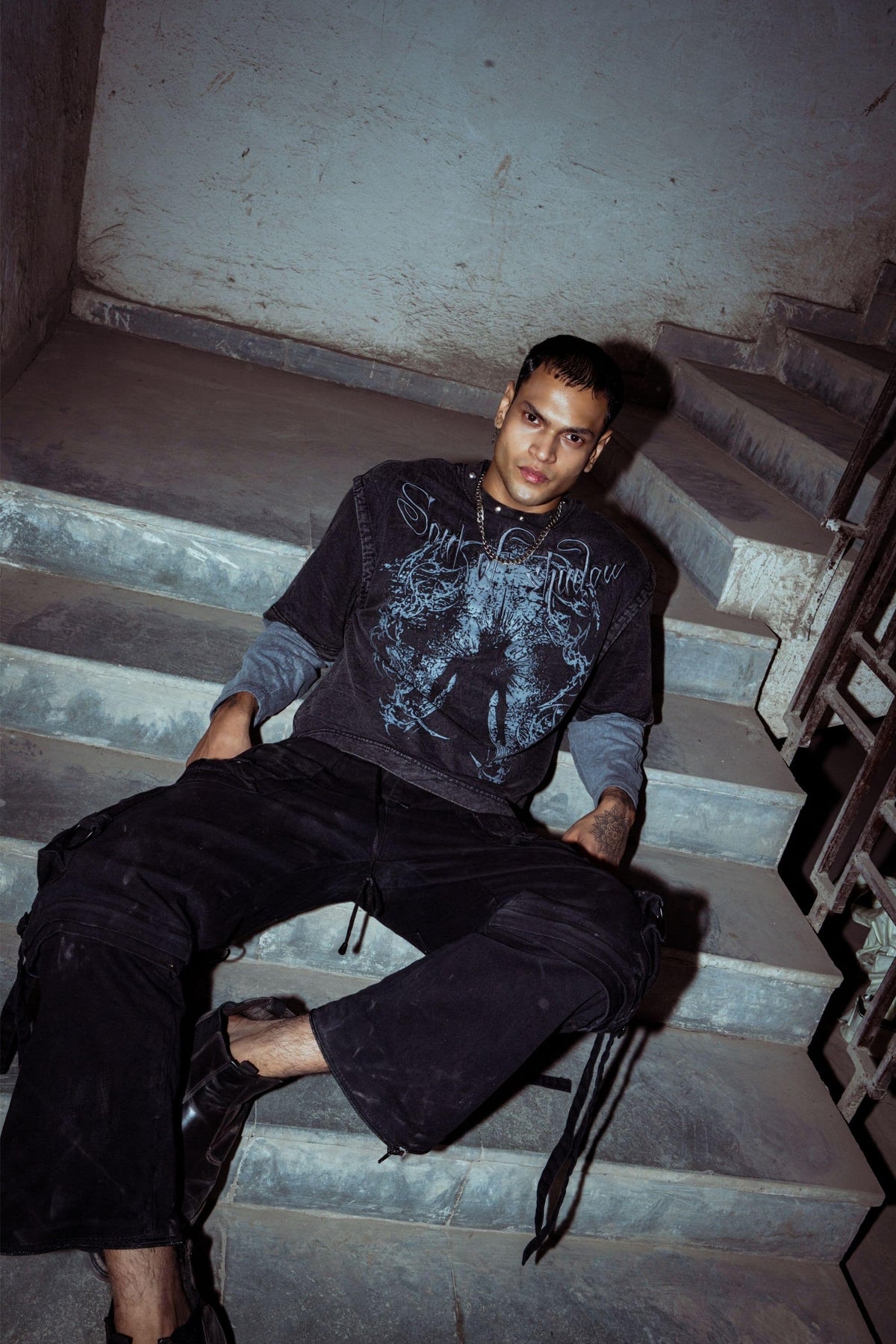 Bold graphic T-shirt in acid washed black, made of premium cotton with a relaxed fit, perfect for casual wear