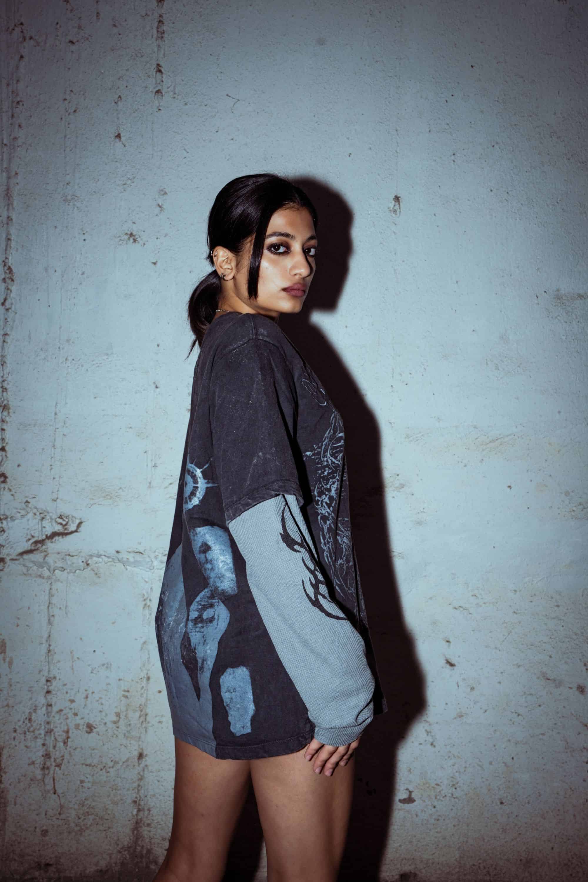 Relaxed fit T-shirt made from premium cotton with textured graphic print in washed black, designed for streetwear