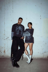 Textured cotton T-shirt with oversized fit, featuring a bold graphic print in washed black for a modern streetwear look