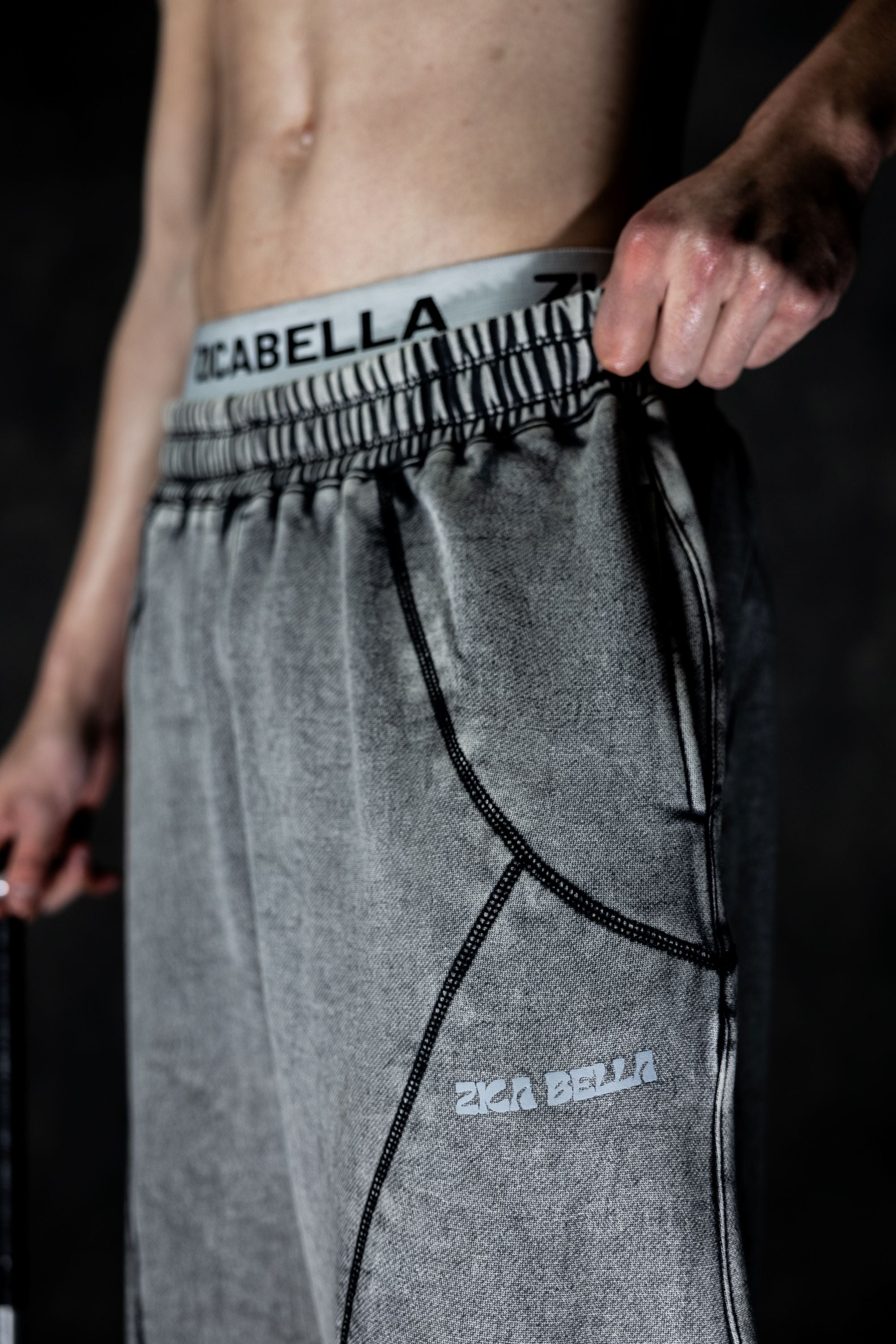 Washed grey fabric texture of baggy lower showing premium material and soft feel