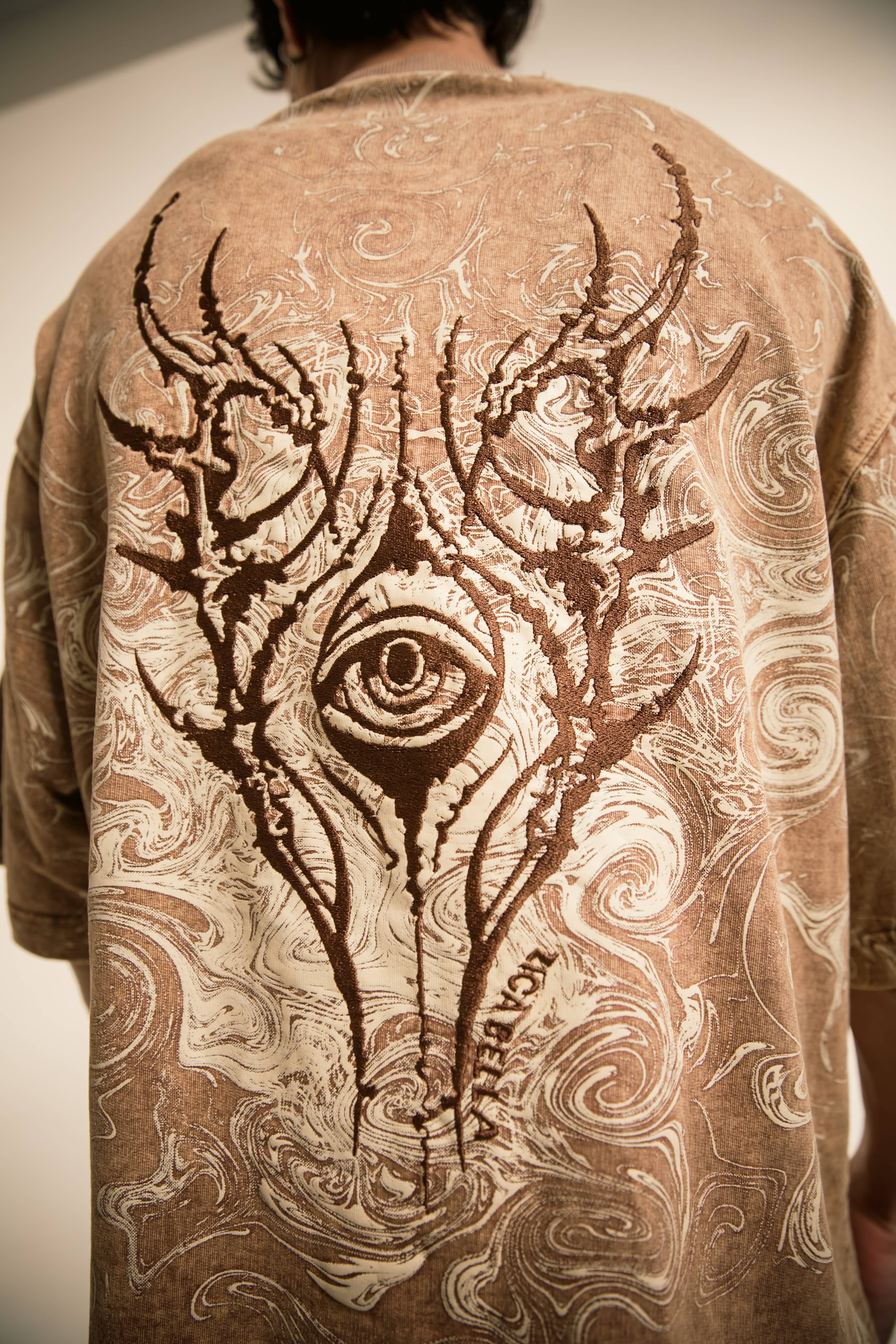 Embroidered Graphic Cotton T-Shirt in Brown, featuring intricate embroidered artwork and oversized fit for a unique streetwear look by zica bella