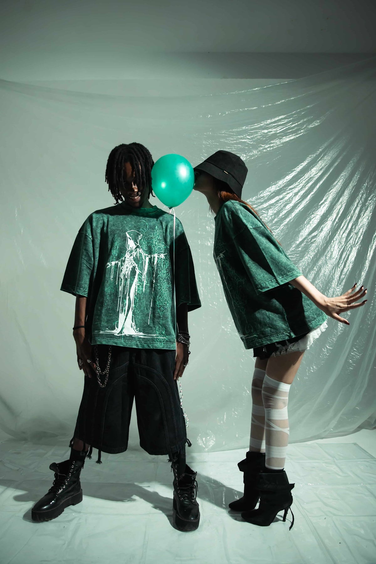 Graphic T-shirt in premium cotton 240 gsm with oversized fit, featuring a bold green graphic design. Ideal for modern streetwear, showcasing a unique artistic print on high quality material for a fashion forward look by zica bella 