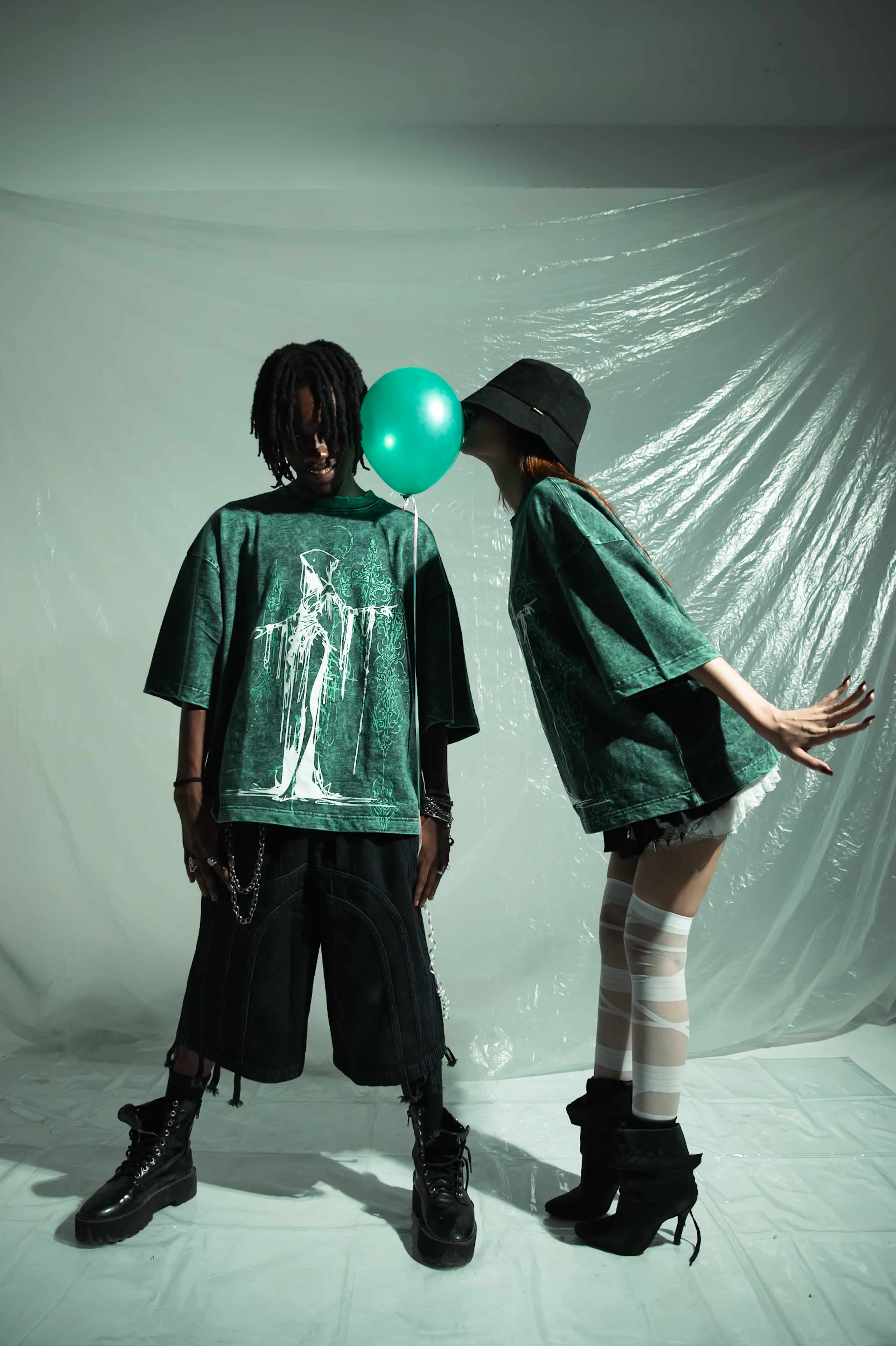 Graphic T-shirt in premium cotton 240 gsm with oversized fit, featuring a bold green graphic design. Ideal for modern streetwear, showcasing a unique artistic print on high quality material for a fashion forward look by zica bella 